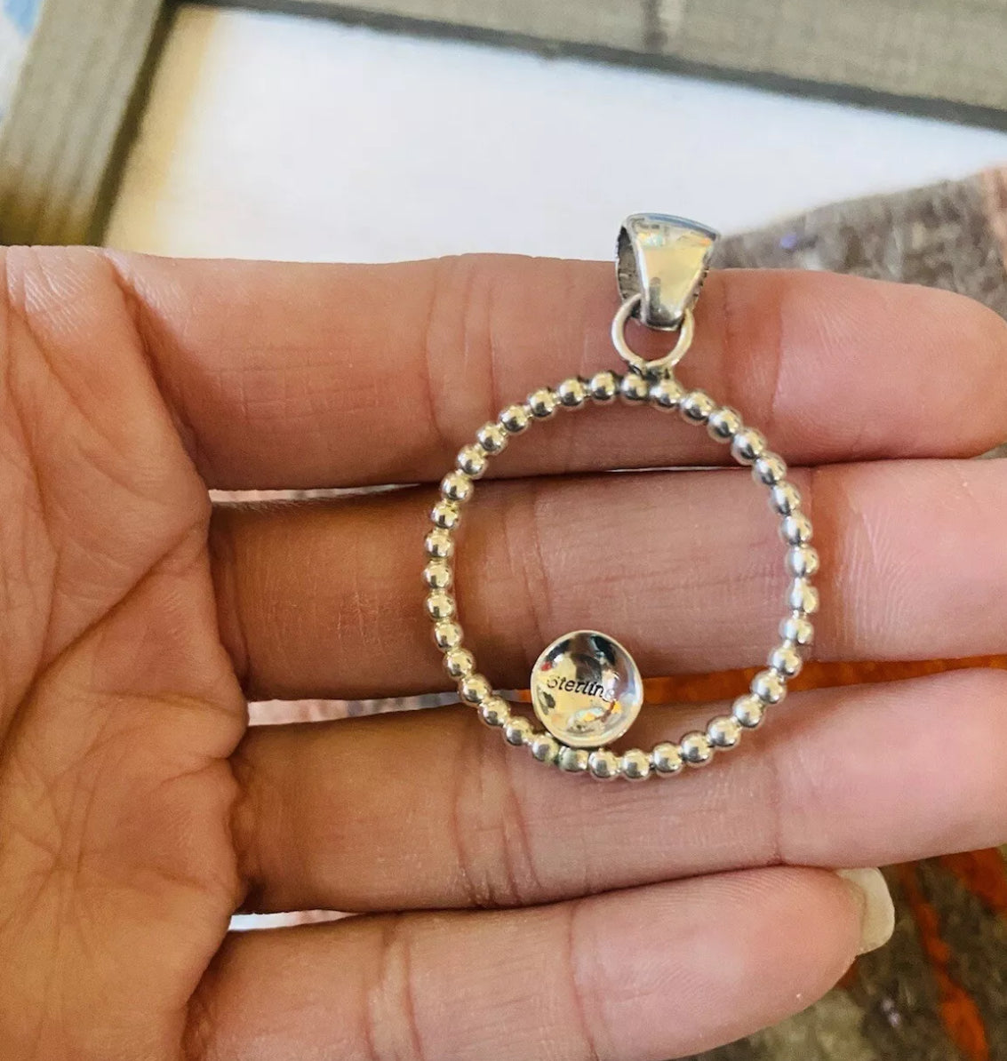 Navajo Sterling Silver Circle Pendant