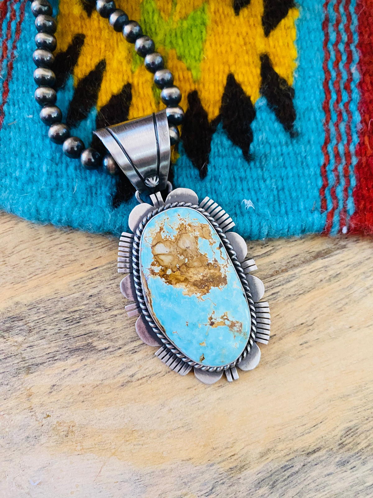 Navajo Royston Turquoise and Sterling Silver Pendant by Russell Sam