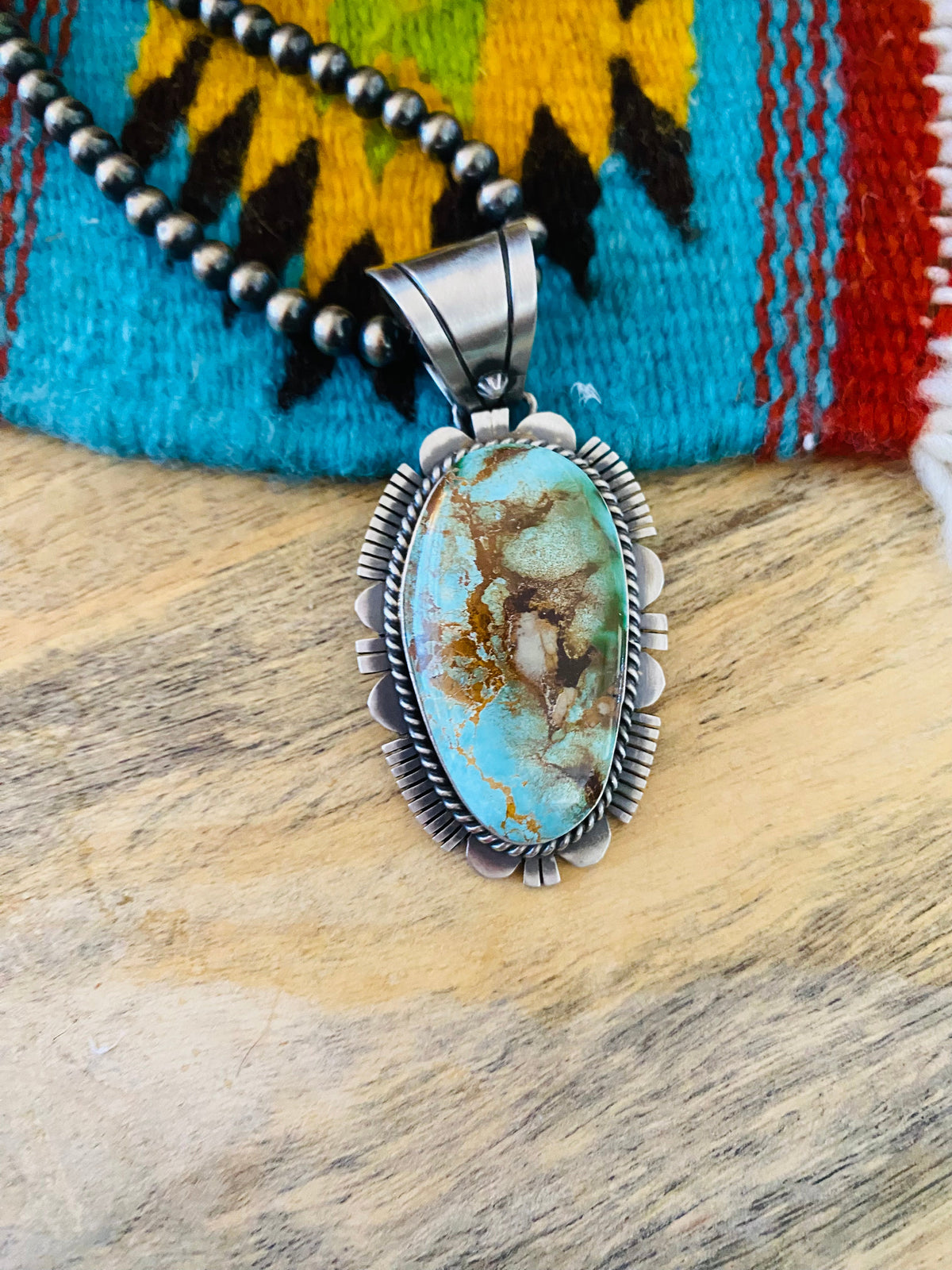 Navajo Royston Turquoise and Sterling Silver Pendant by Russell Sam